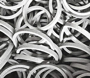 A pile of metal rings that are in the air.